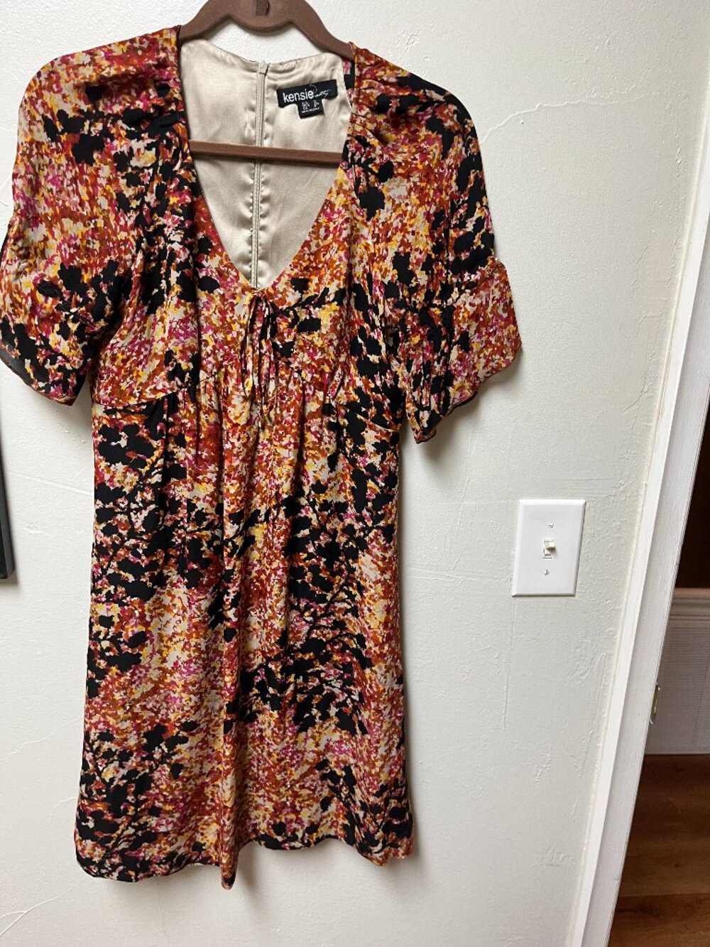 Kensie short-sleeve mini dress with a vibrant floral print